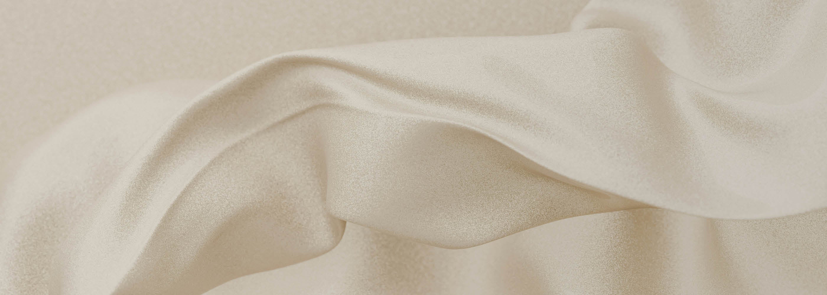 Flowing, smooth beige satin fabric with soft folds and a subtle shimmer in the light.