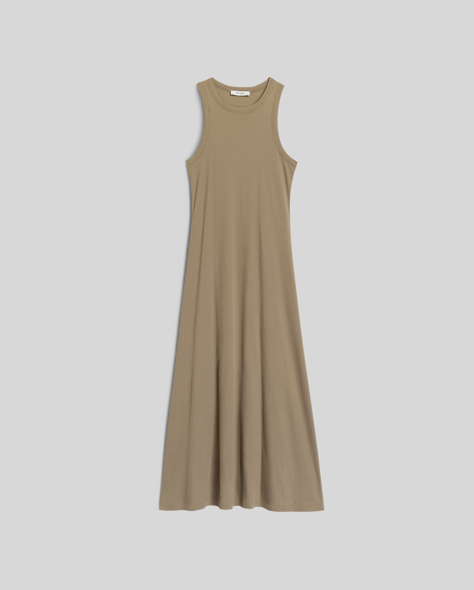 The IVY OAK KRISTYNA Dress is a sleeveless, long beige dress with a round neckline and flared skirt, shown laid flat on a white background.