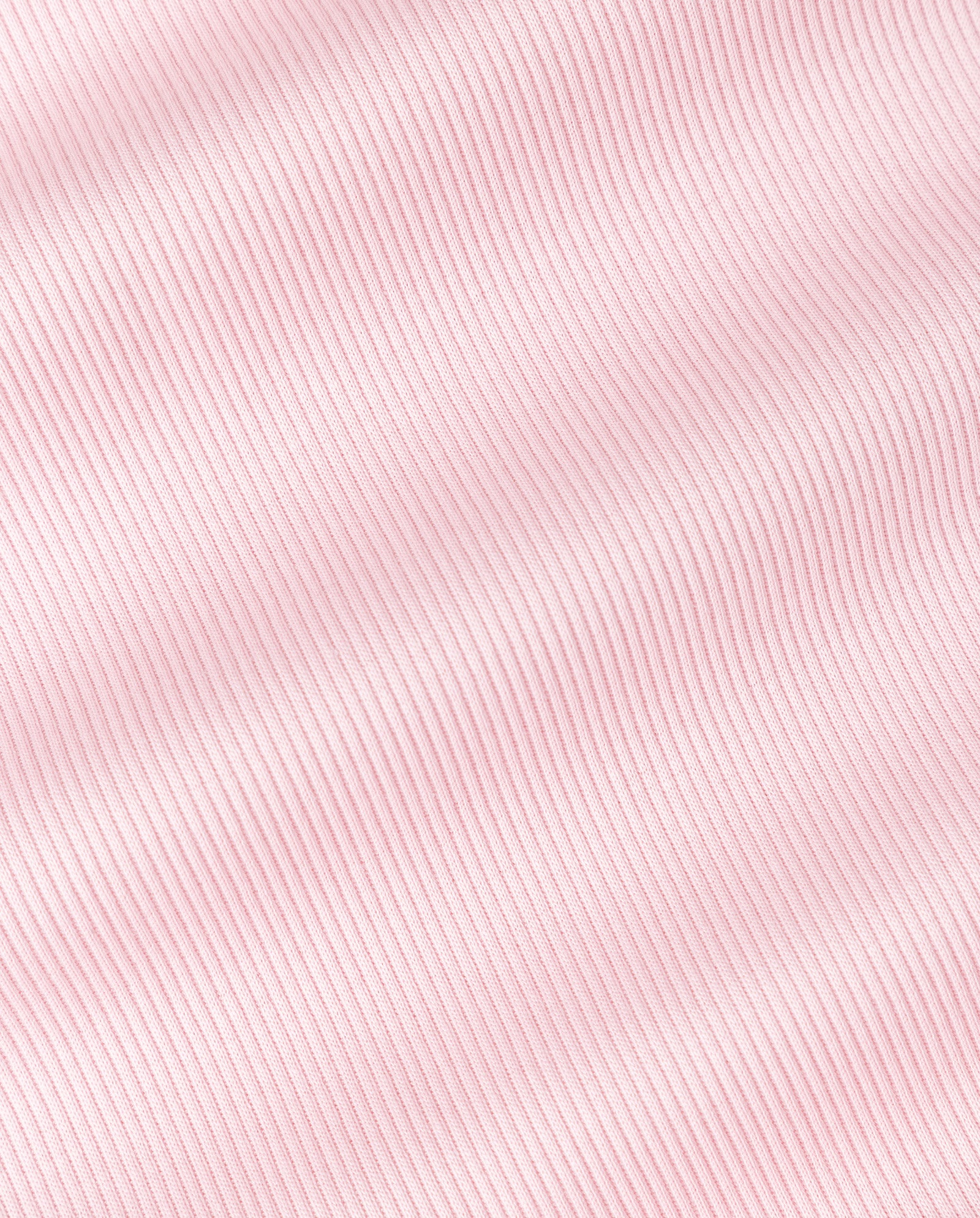 The KRISTYNA Dress by IVY OAK features light pink ribbed knit fabric with subtle, wavy diagonal lines for a textured look—ideal for a stylish flared skirt or dress.