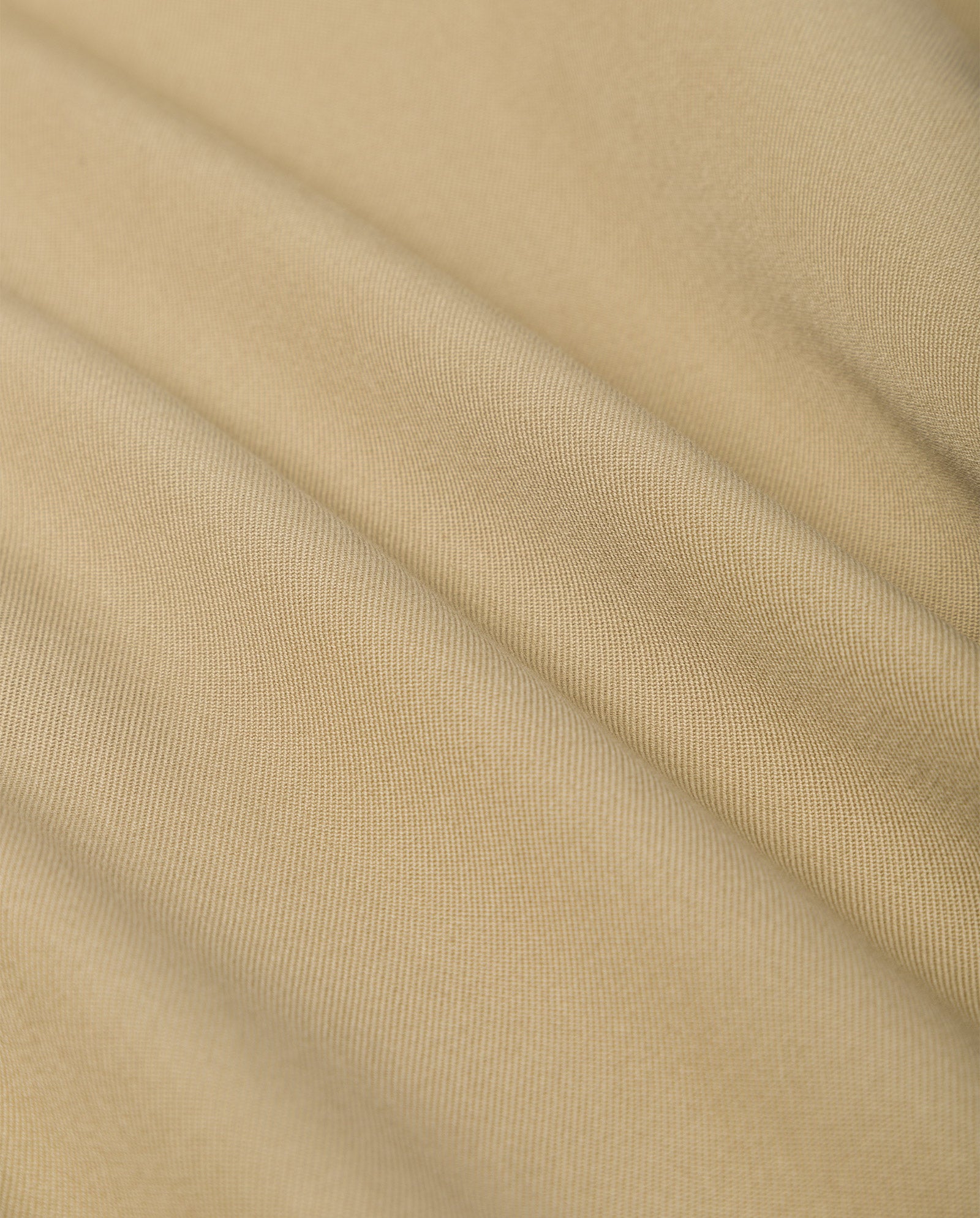 The CIARA Coat by IVY OAK features beige fabric with a fine texture and soft diagonal folds, ideal for an oversized trenchcoat design with an adjustable belt.