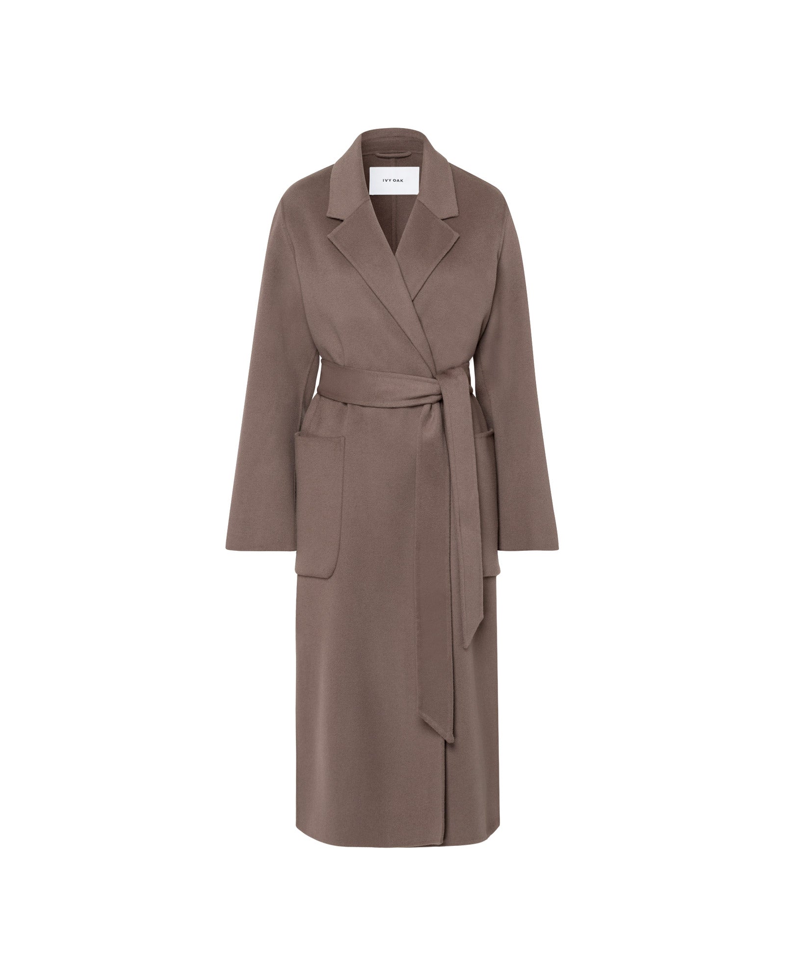 The IVY OAK CELIA Doubleface Coat is a long brown Responsible Wool Standard wool coat with large lapels, a belted waist, two front pockets, and a midi length, shown on a plain white background.