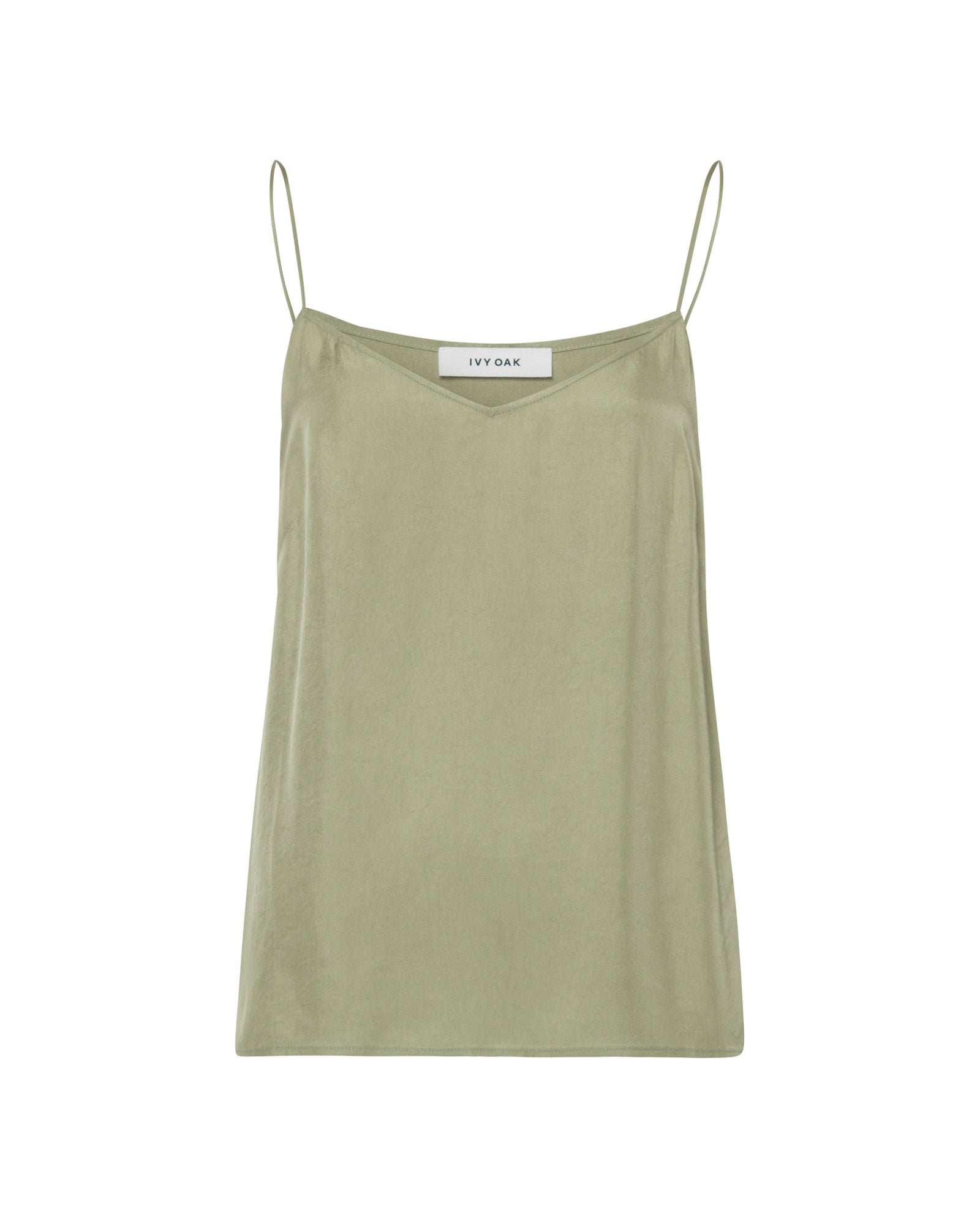 The IVY OAK TILDA ANN Top is a light green spaghetti strap camisole with a subtle V-neckline, shown against a plain white background.