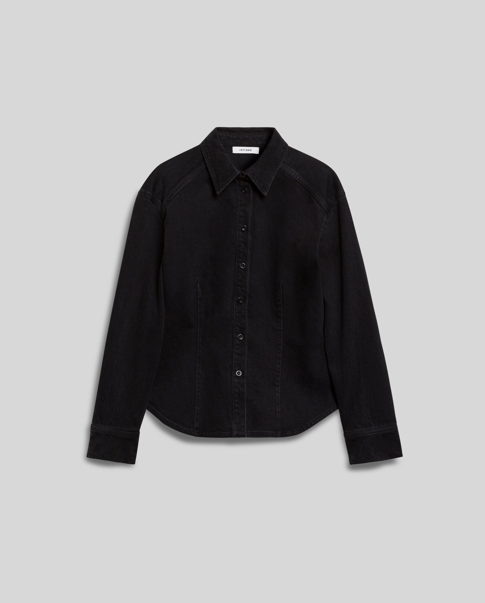 The IVY OAK BERENICE Blouse is a black long-sleeve washed denim button-up shirt with a collar, shown on a plain gray background.
