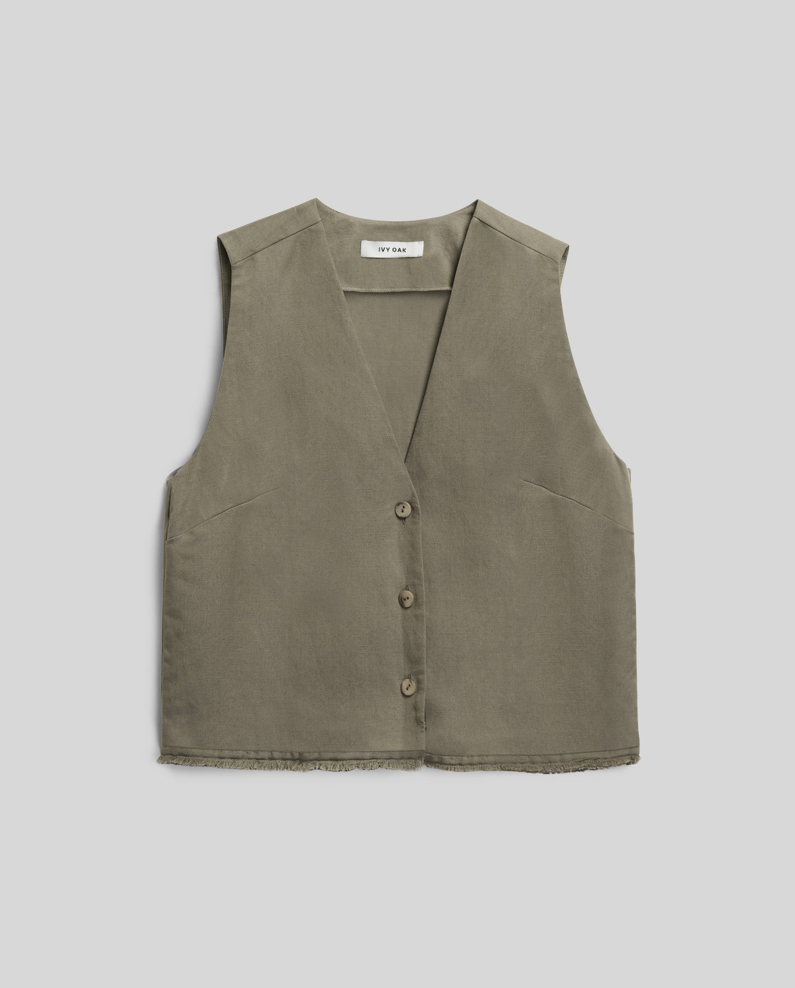 The IVY OAK TALA ANN Top is an olive green, sleeveless linen-blend vest with button closure, v-neckline, and raw hem, shown laid flat on a light background.