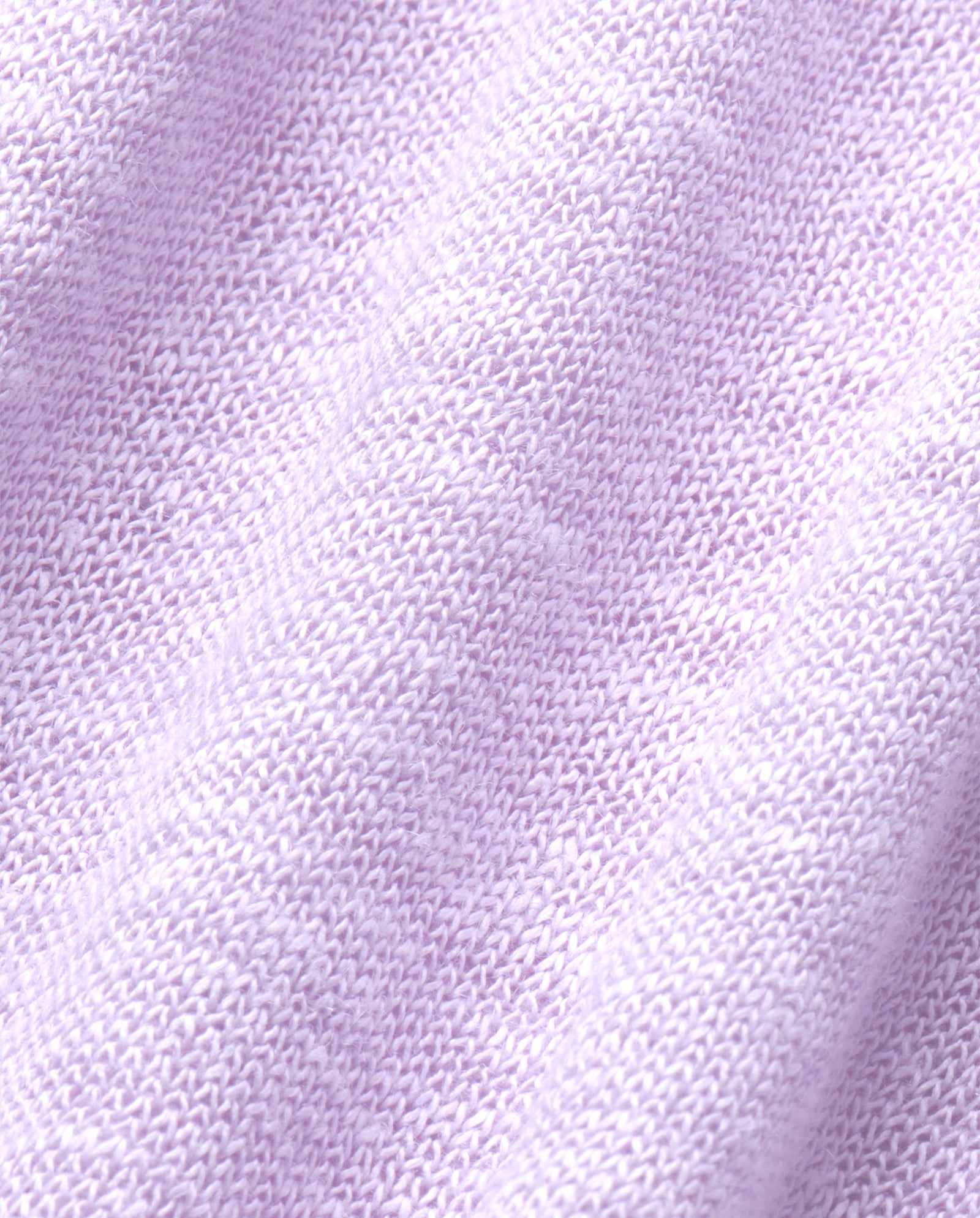 Close-up of the FELINE Top by IVY OAK in light purple Mélange Jersey, showcasing its soft folds and textured pattern—ideal for a lightweight, stylish look.