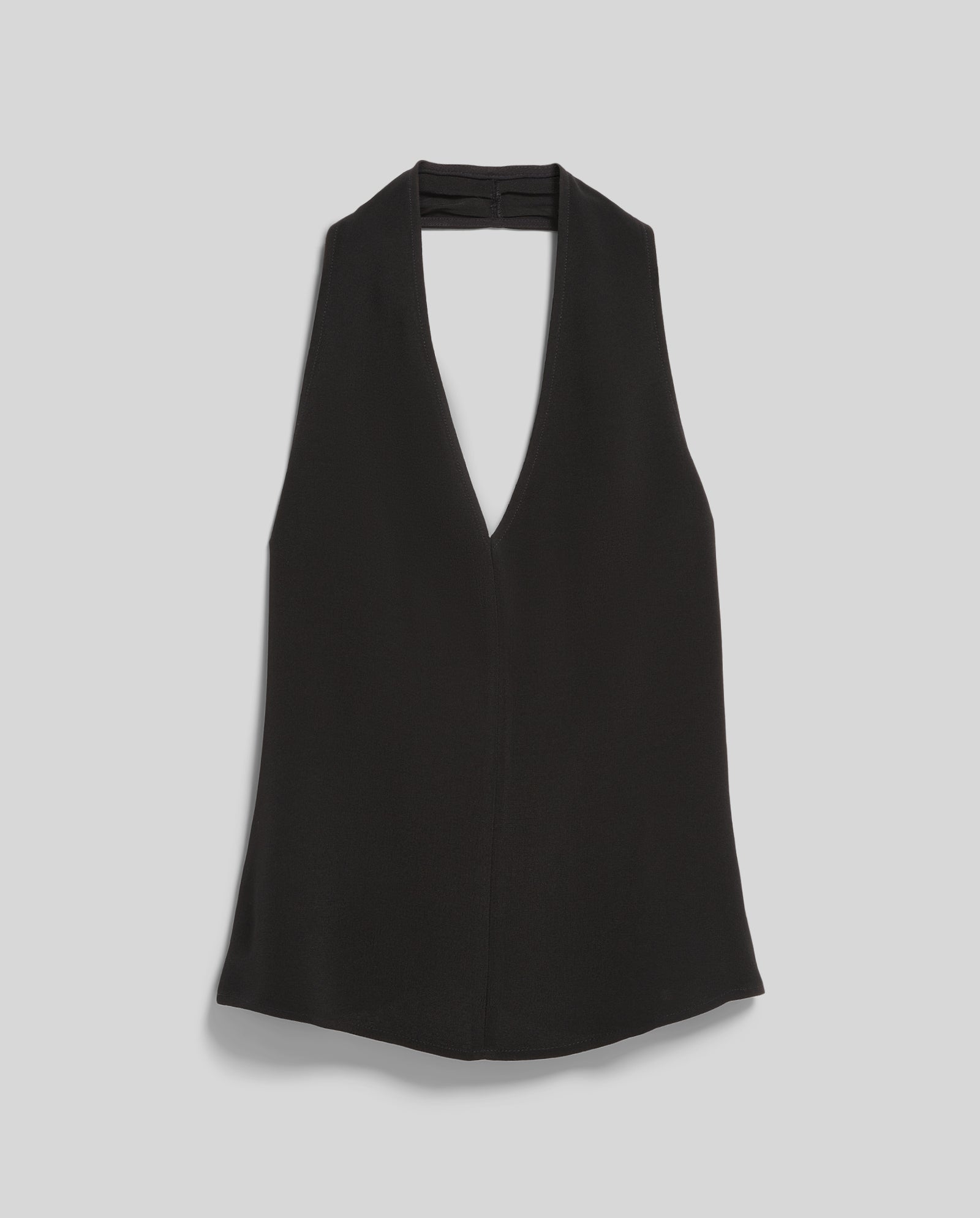 The IVY OAK TANSY Top is a sleeveless black neckholder with a deep V-neckline, made from crepe fabric and shown laid flat on a light gray background.