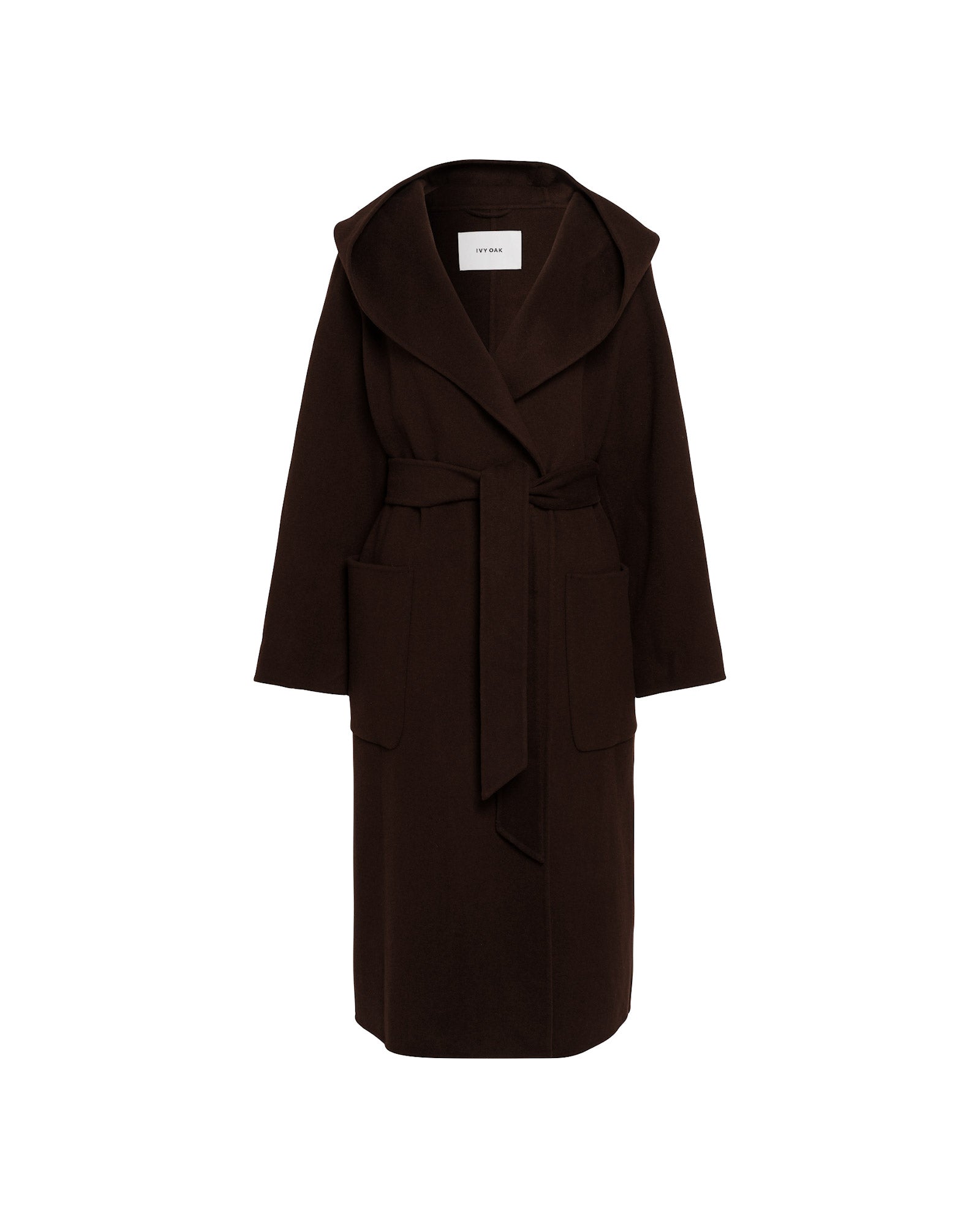 The IVY OAK CELIA EDIE Coat is a long dark brown wool coat featuring large front pockets and a wide, draped hood. Crafted under the Responsible Wool Standard, its shown on a white background.