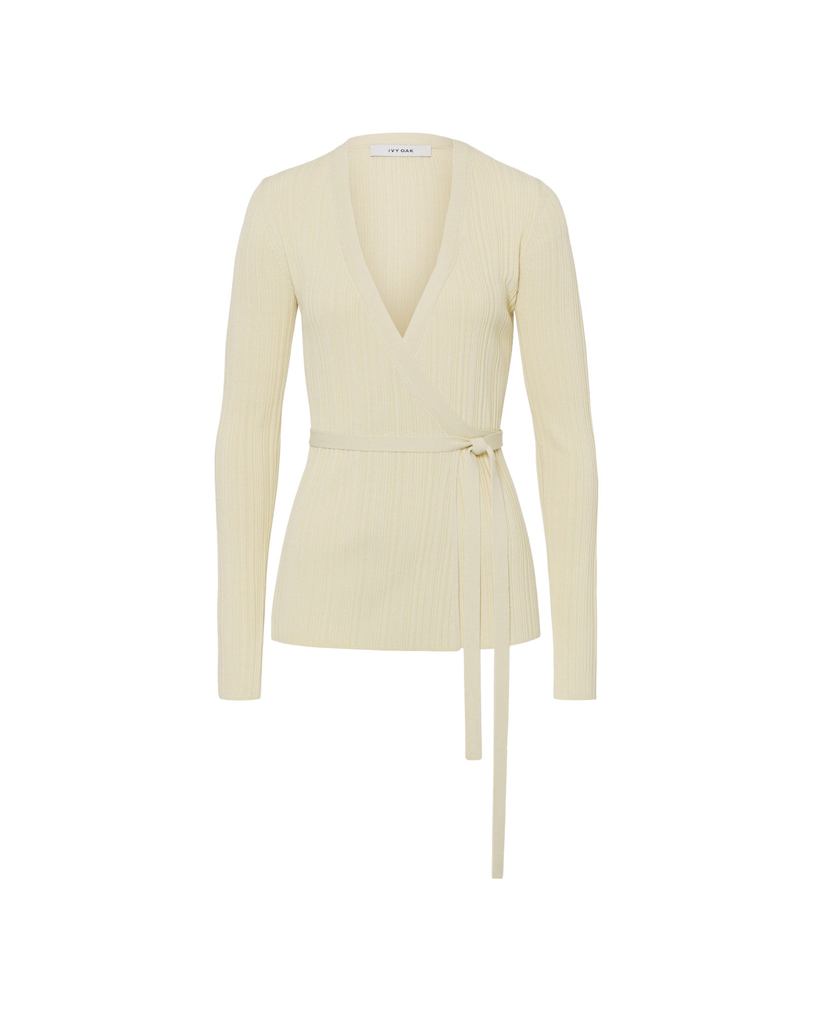The KIERA Cardigan by IVY OAK is a cream-colored, long-sleeve viscose wrap with elegant sleeves, a ribbed irregular knit, and a waist tie, shown on a white background.