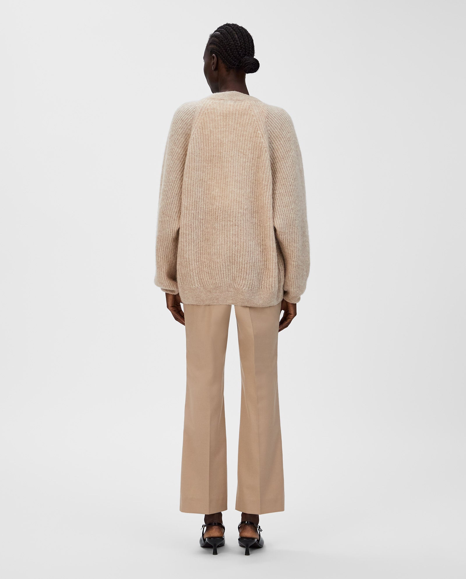 A person wearing the IVY OAK KEONA ANN Cardigan stands facing away against a plain light background.