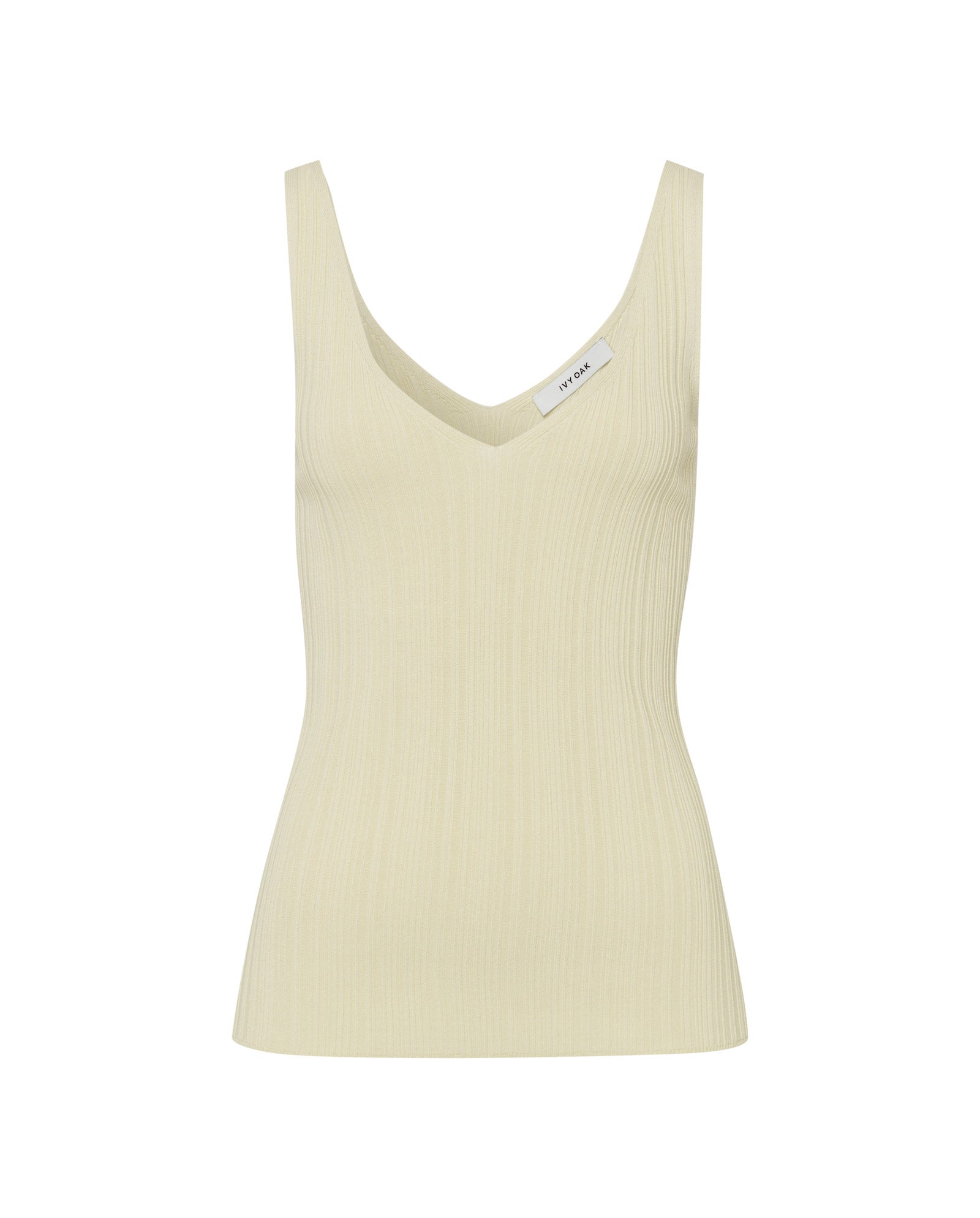 The IVY OAK KYM Top is a sleeveless, light beige viscose top with a ribbed, stretchy knit and deep V-neckline, shown on a plain white background.