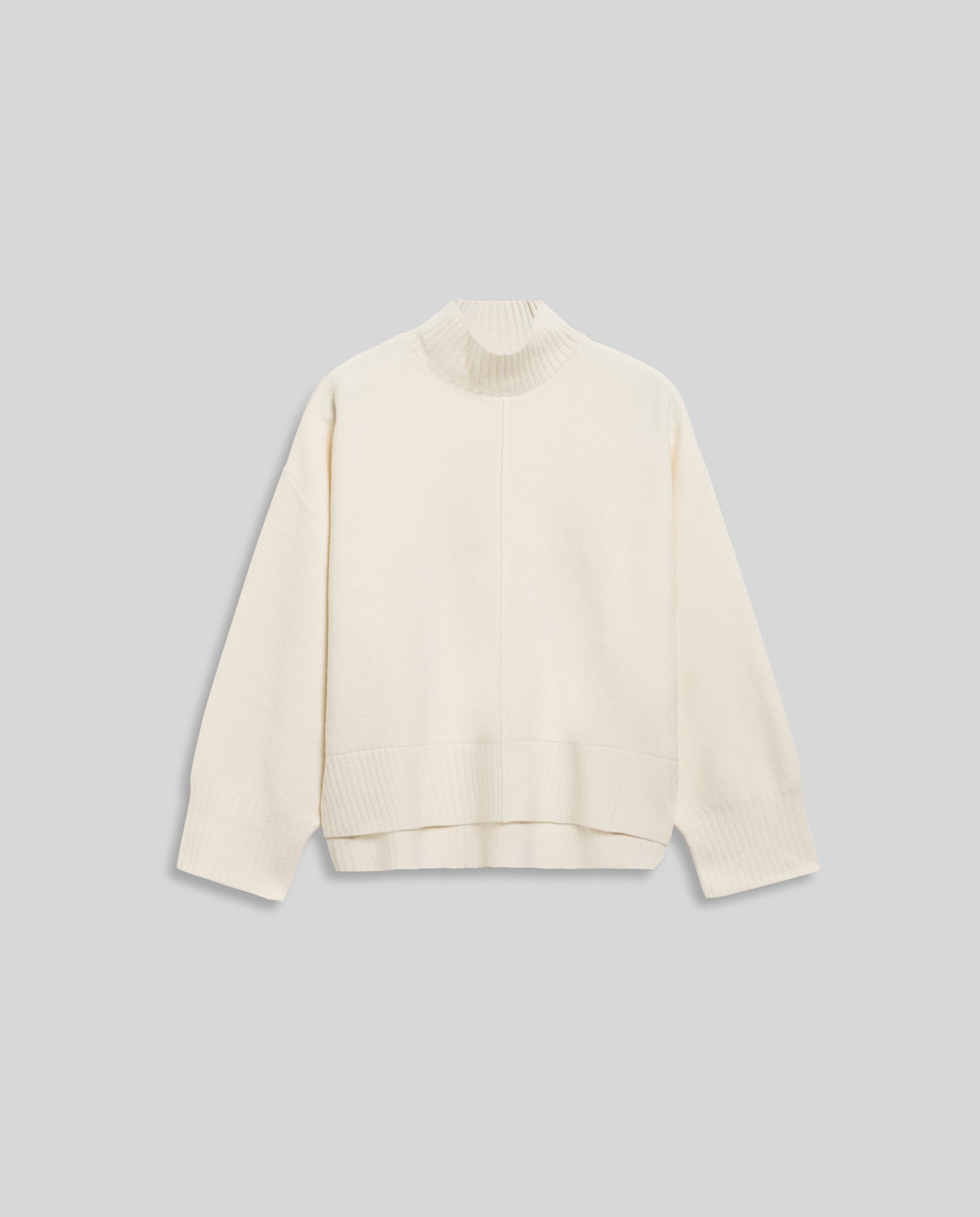 The IVY OAK KAREEN ROSE Jumper is a cream-colored, long-sleeve Merino wool knit sweater with a high ribbed neckline, shown on a light gray background.