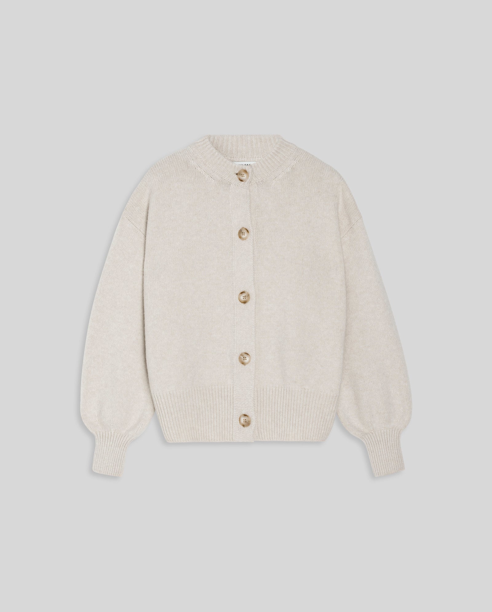 The IVY OAK KARMA Cardigan, a beige cashmere-blend piece with long wide sleeves and brown buttons, is displayed flat on a light gray background.