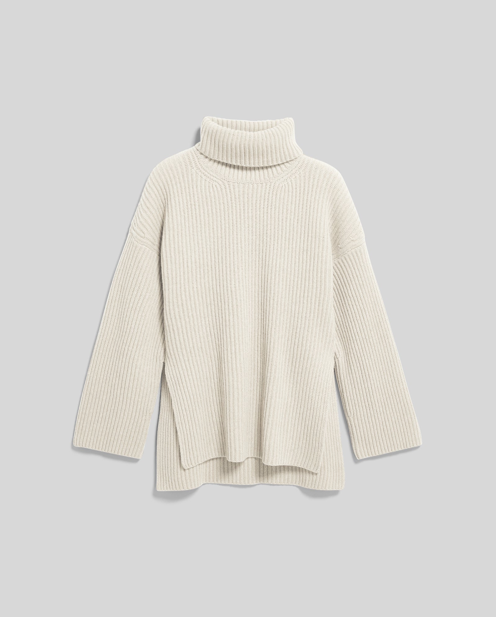 The KYOMI ANN Jumper by IVY OAK is a beige chunky knit with ribbed texture, long sleeves, and a high neck, shown laid flat on a light gray background.
