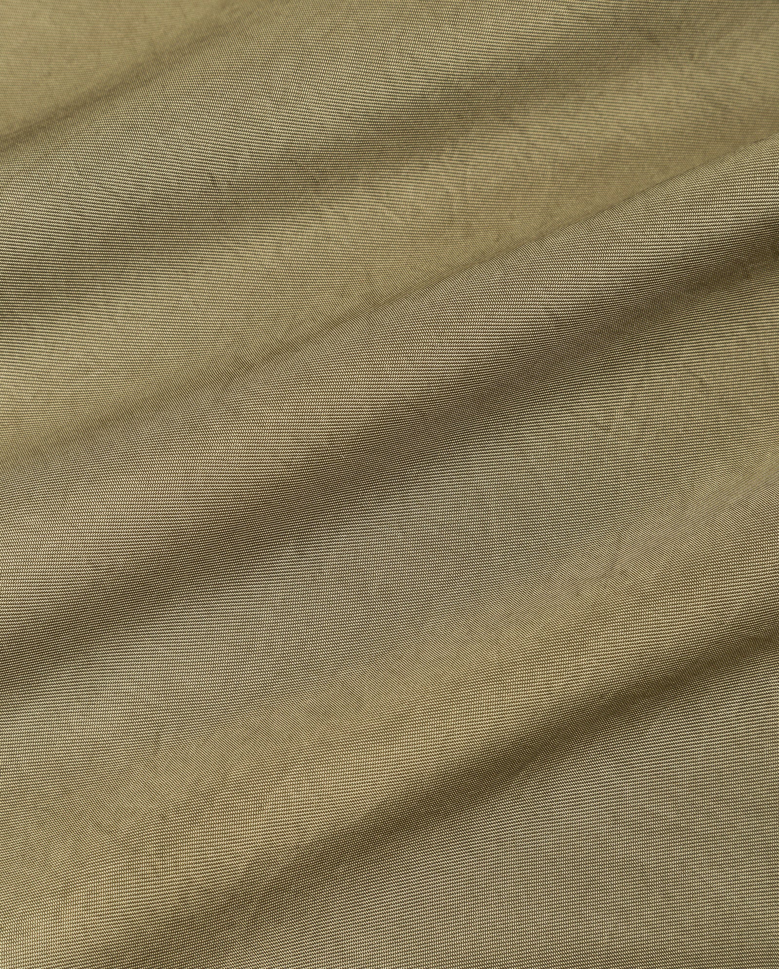 Close-up of olive green fabric from the IVY OAK PATRICIA Jumpsuit, made with Naia acetate and showcasing a visible texture with gentle diagonal folds.