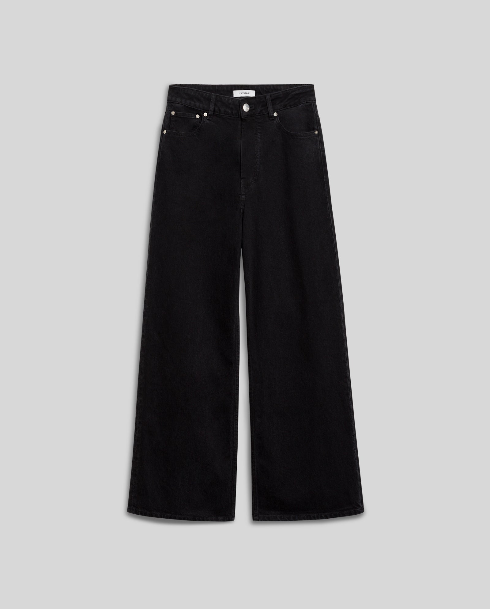 The PRIJANKA Trousers by IVY OAK are black high-waisted denim jeans with a loose wide leg, front button, and pockets, shown on a plain gray background.