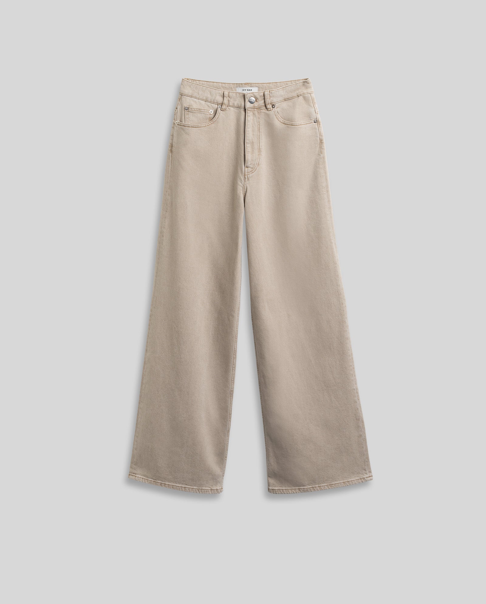 The PRIJANKA Jeans by IVY OAK are beige, high-waisted denim with a loose wide-leg fit, front pockets, and belt loops, displayed flat on a light gray background.