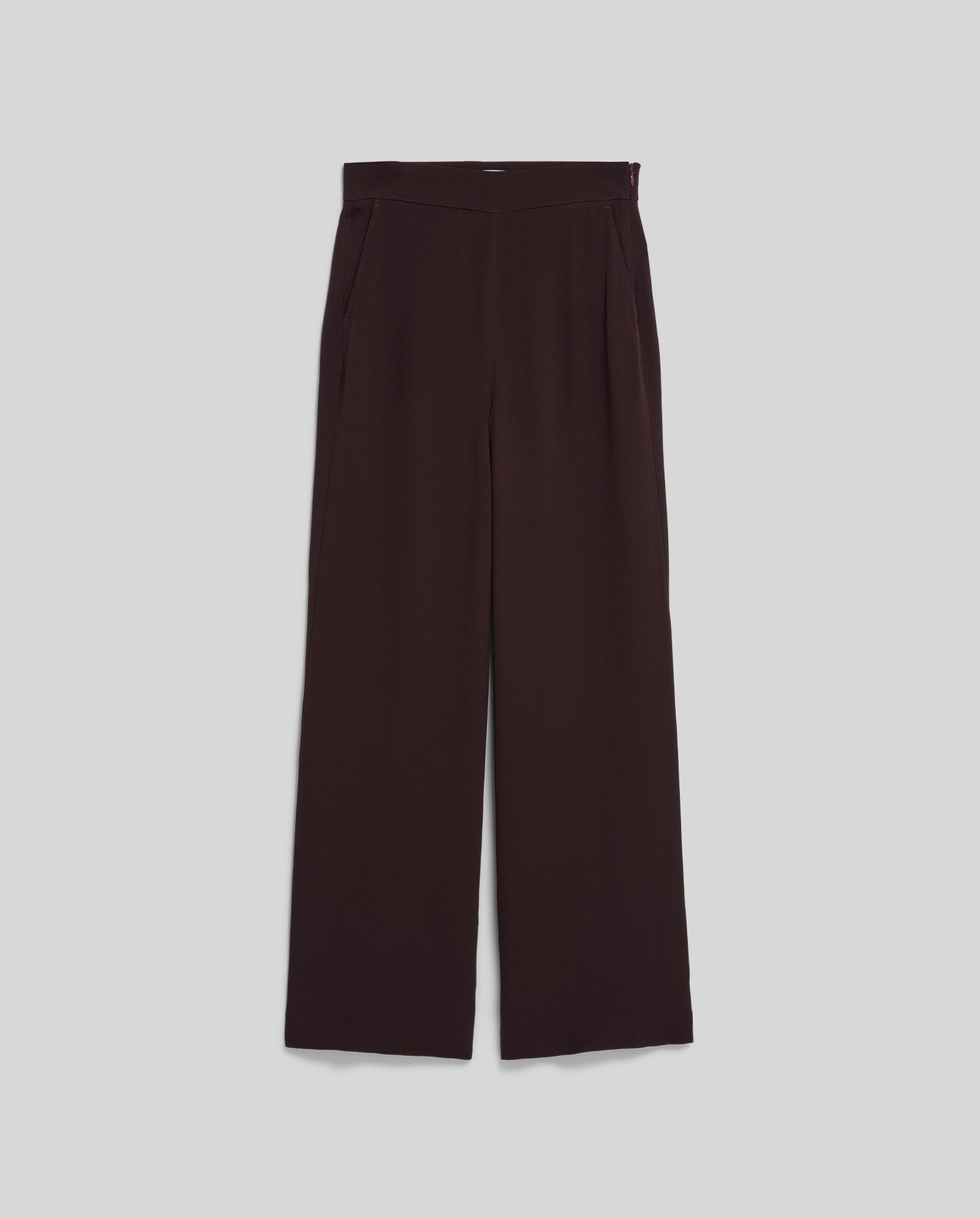 The IVY OAK PHILINE SUE Pants are high-waisted, wide-leg black trousers made from sleek crepe fabric with a concealed zipper, shown flat on a plain light gray background.
