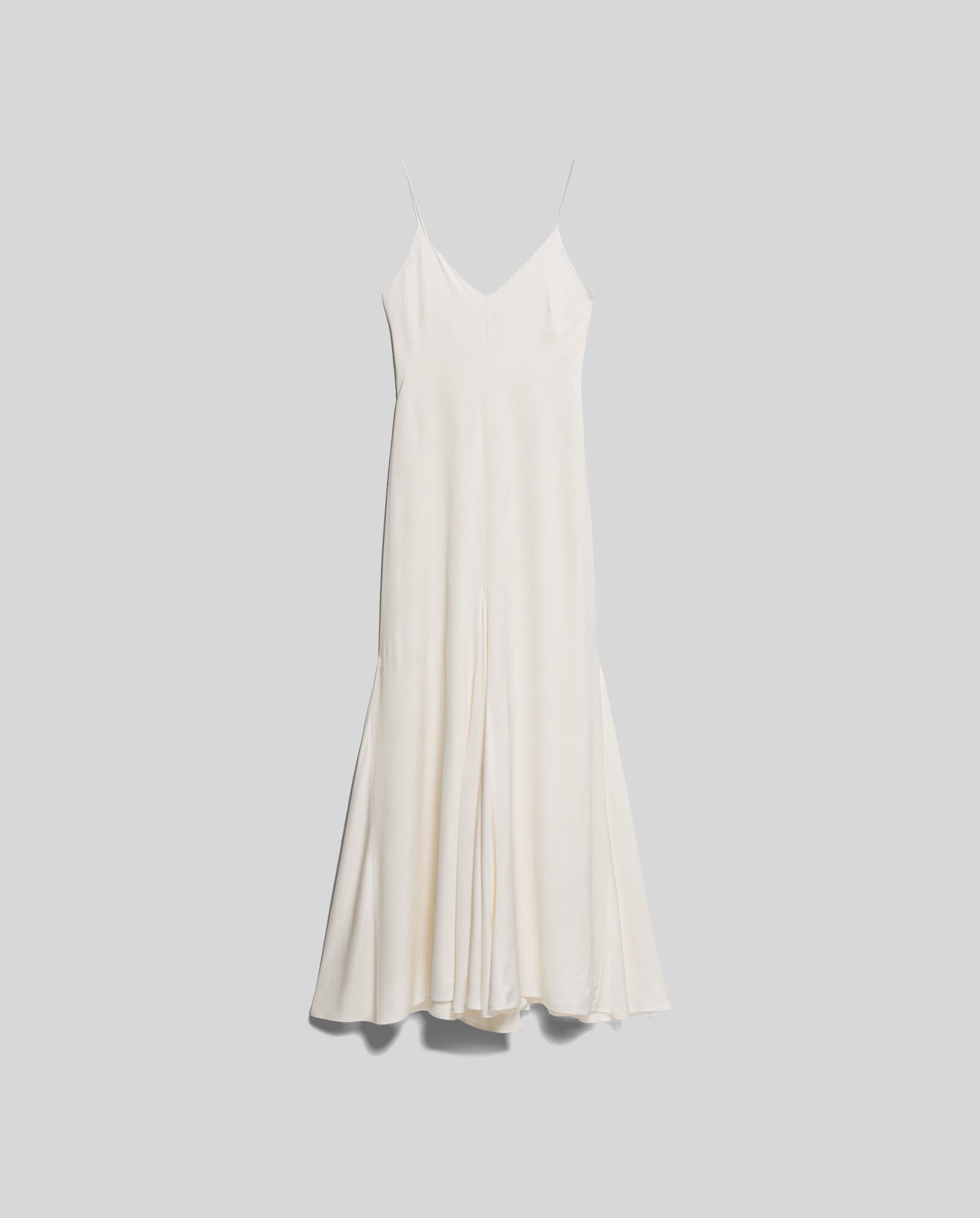 The MADELIN IDA Bridaldress by IVY OAK is a cream-colored, sleeveless maxi slip dress in NAIA™ acetate with thin spaghetti straps and a flared hem, shown on a plain background.