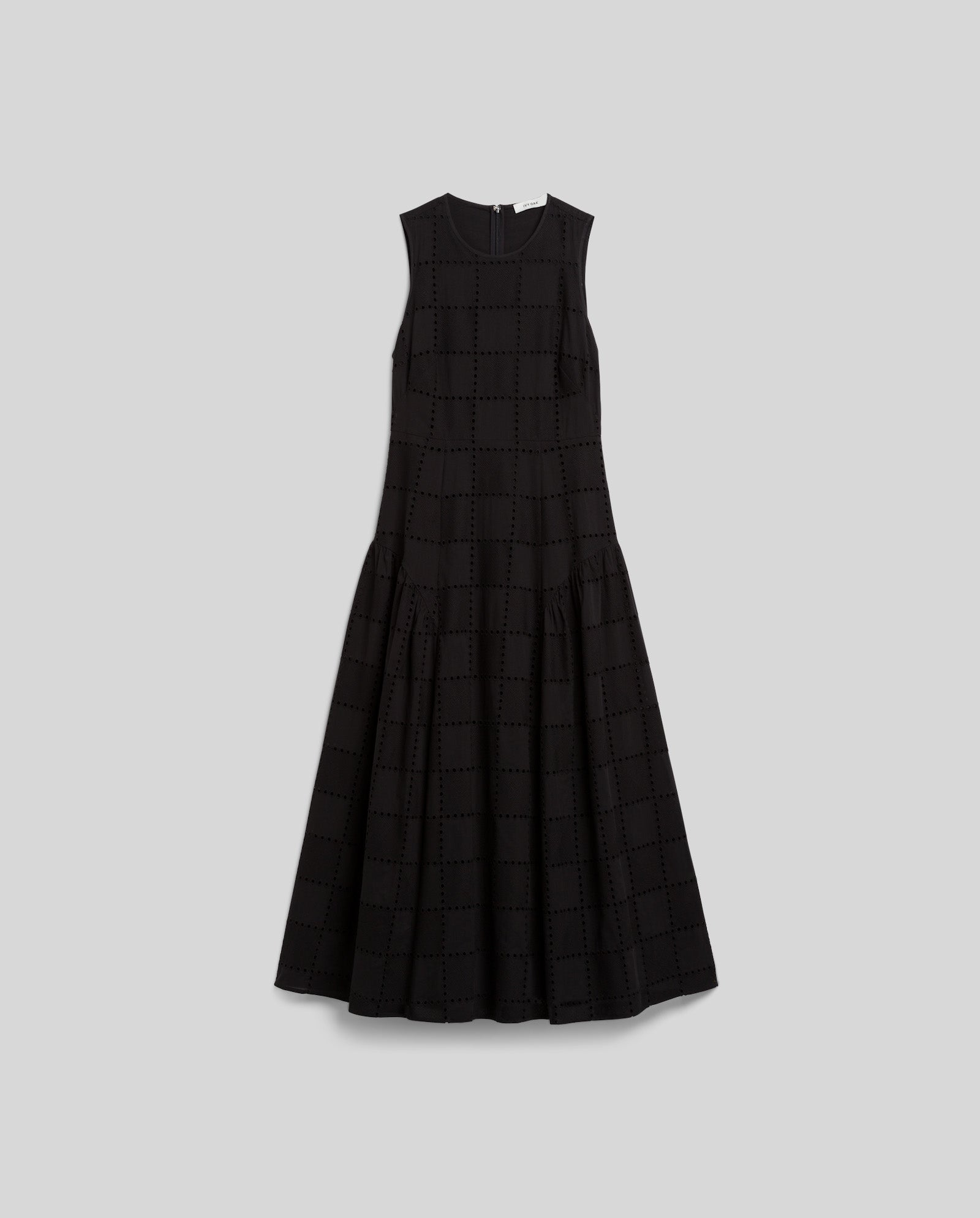 The MARCA ROSE Dress by IVY OAK is a sleeveless black midi with a subtle checkered pattern and softly gathered skirt, shown against a plain gray background.