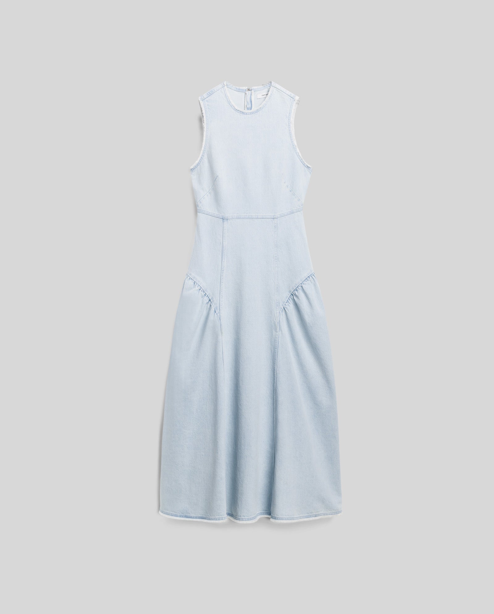 The MARCA ANN Denim Dress by IVY OAK is a sleeveless light blue dress with fringe details, a fitted bodice, and flared skirt, shown on a plain background.