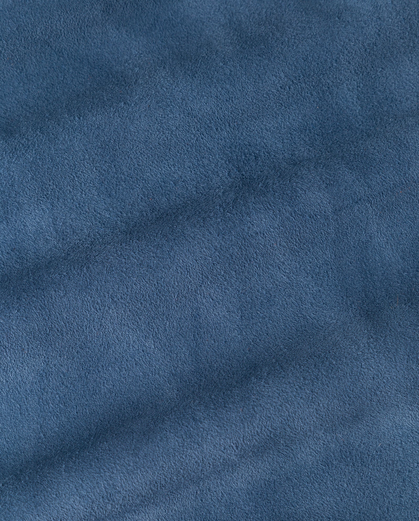 Close-up of blue suede fabric from the IVY OAK LENA Jacket, showcasing its soft, textured surface and delicate shading.
