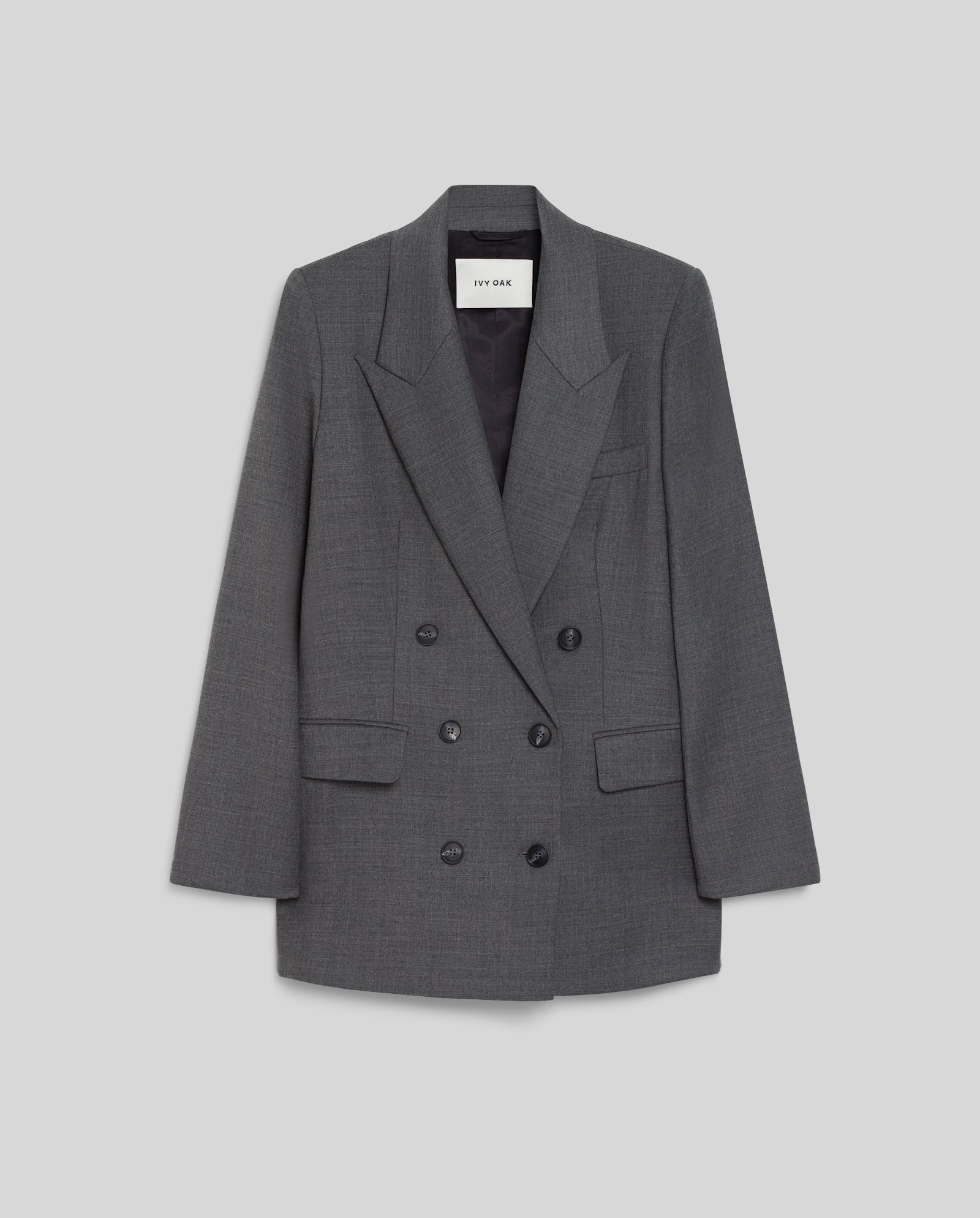 The IVY OAK JULIETTE ROSE Blazer is a dark gray, boxy double-breasted jacket with black button closure, shown against a light gray background.