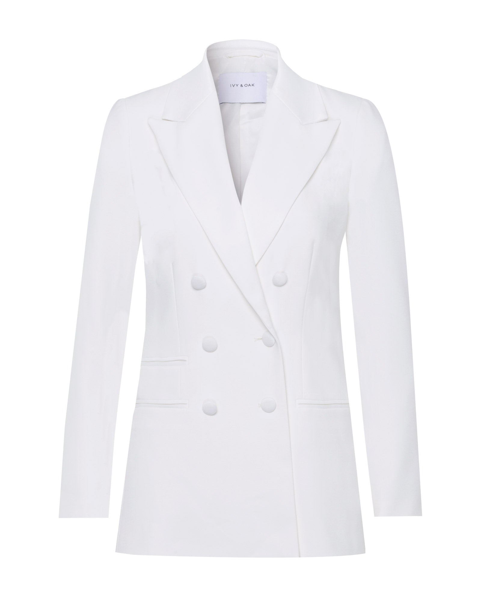 The IVY OAK JENNIFER Blazer is a white double-breasted style with a wide lapel collar, sleeve slits, and two front pockets, shown on a plain background.