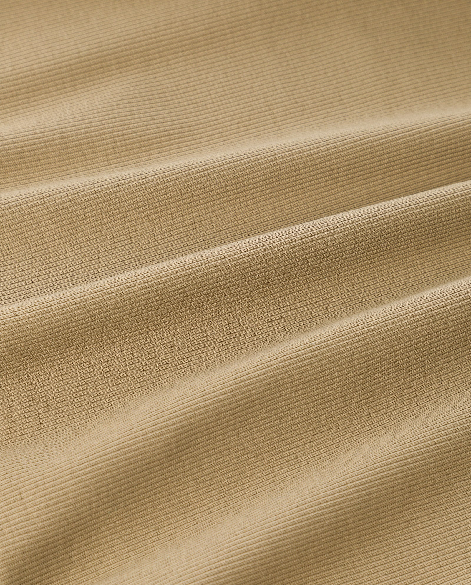 Close-up of the KLARA ANN Tanktop by IVY OAK in beige corduroy, showing visible rib structure and diagonal folds.