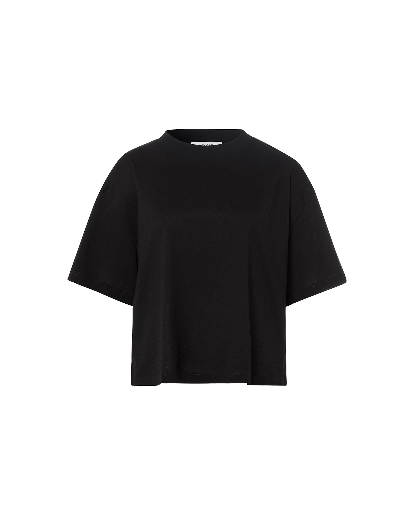 The KYLA T-Shirt by IVY OAK is an oversized, boxy black tee with short sleeves, made from organic cotton and shown on a white background.