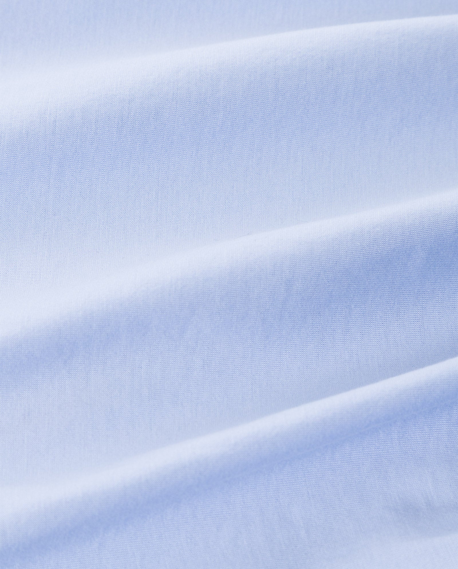 Close-up of light blue organic cotton with soft folds and a smooth texture—a basic must-have, perfect for the IVY OAK KYLA T-Shirt.