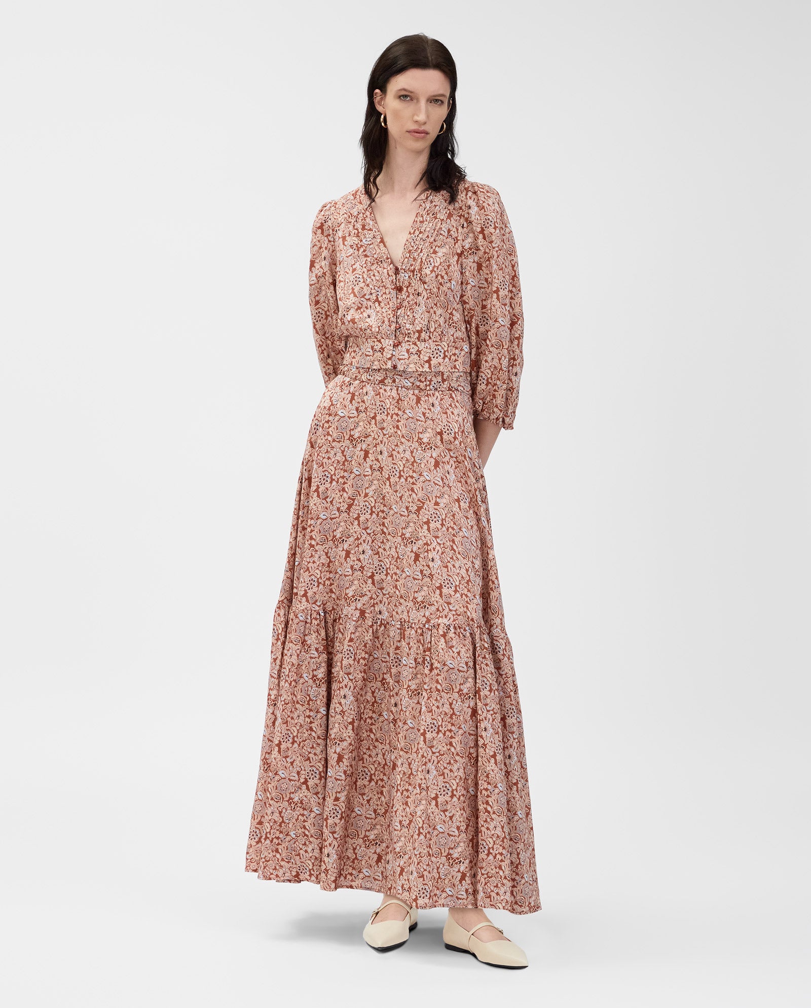 A woman wearing the IVY OAK ENRICA Blouse stands against a white background.