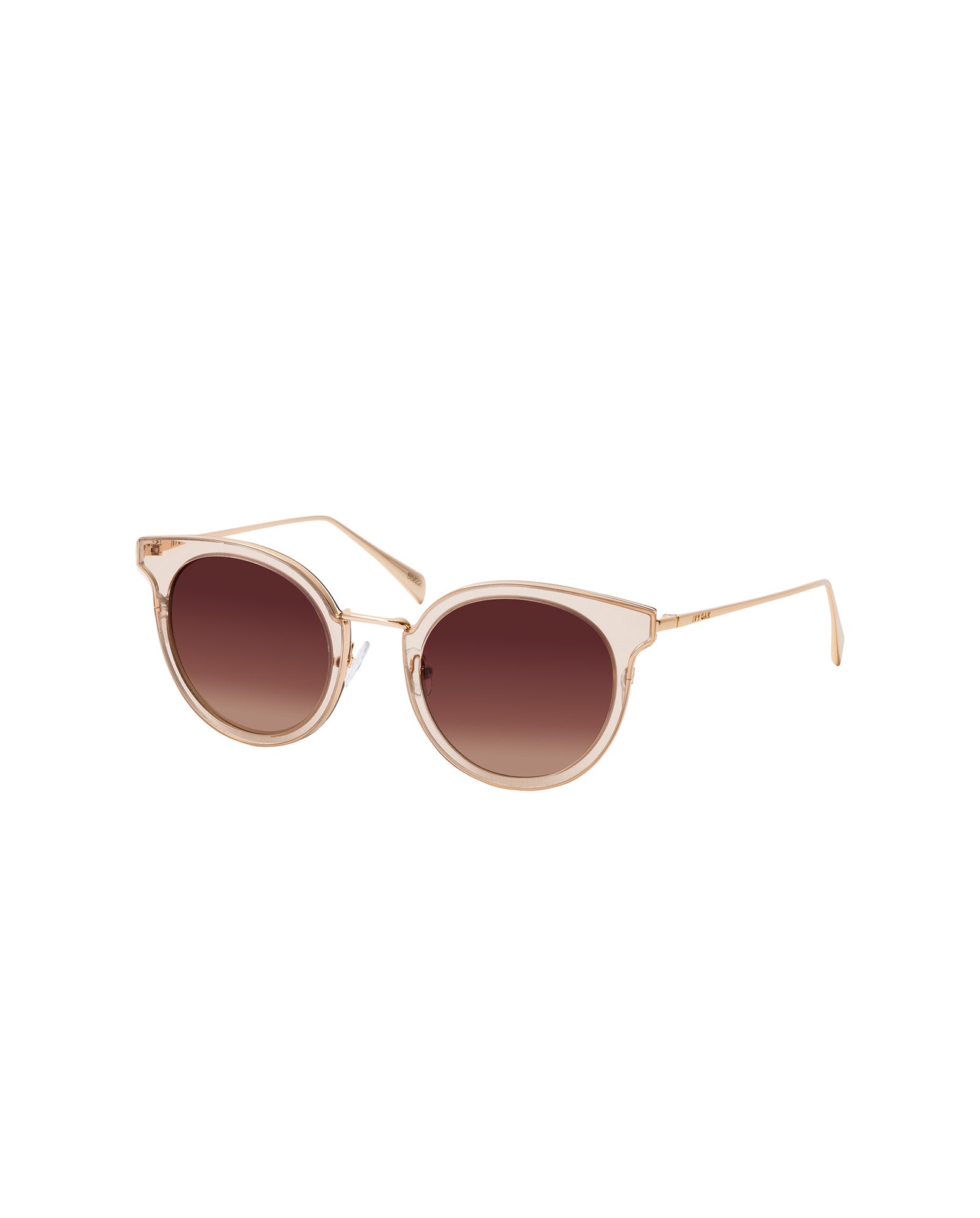 The IVY OAK Abigail Sunglasses feature gold frames and round brown gradient lenses made from plant cellulose, displayed on a white background.