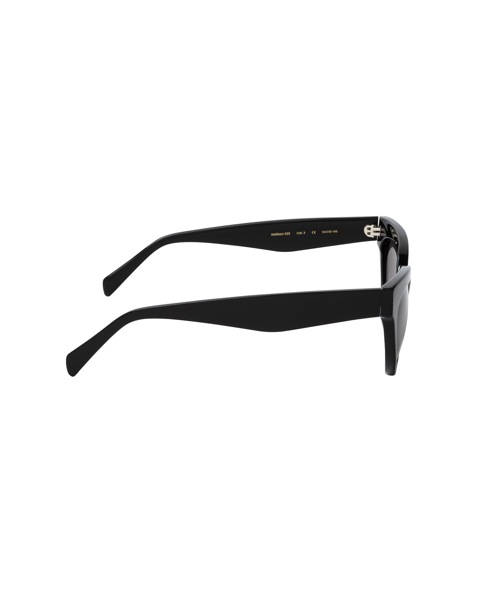 The Addison Sunglasses by IVY OAK are black, rectangular shades viewed from the side, featuring thick arms and a minimalist design—crafted from premium Mazzucchelli acetate for lasting durability and style.