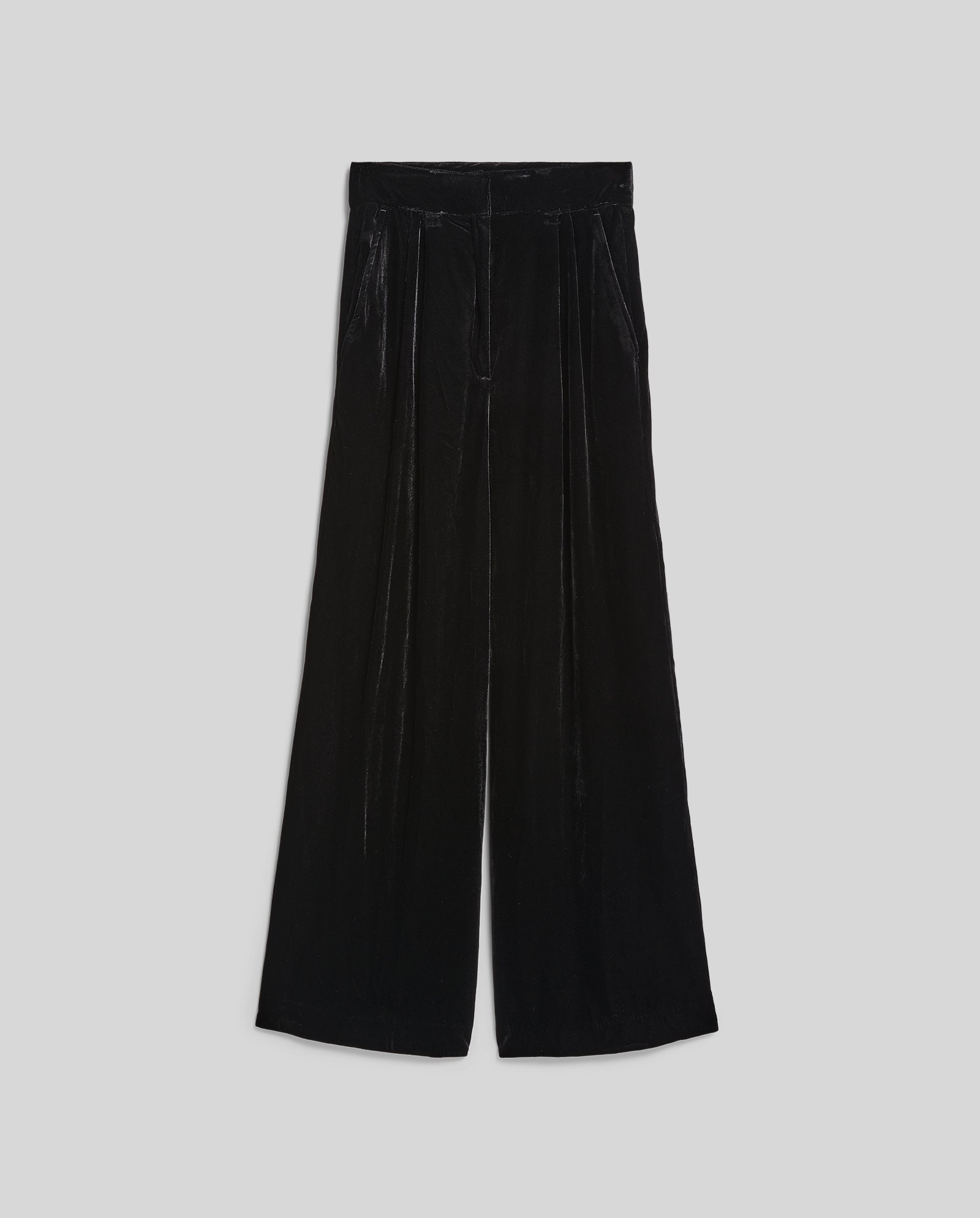The PRESCILLIA ANN Pants by IVY OAK are black women’s velvet trousers with a wide-leg silhouette, displayed laid flat on a light gray background.