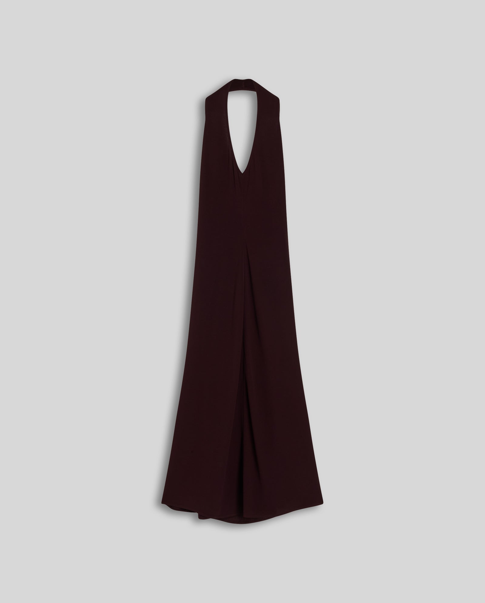 The NESTA Dress by IVY OAK is a sleeveless black crepe neckholder dress with a deep V-neckline and side zipper, shown against a plain gray background.